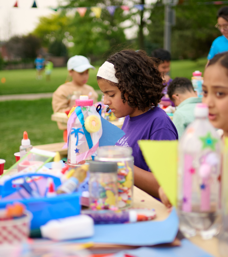 Kids doing outdoor crafts at Summer Day Camp