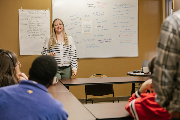Facilitator leading employment session for youth